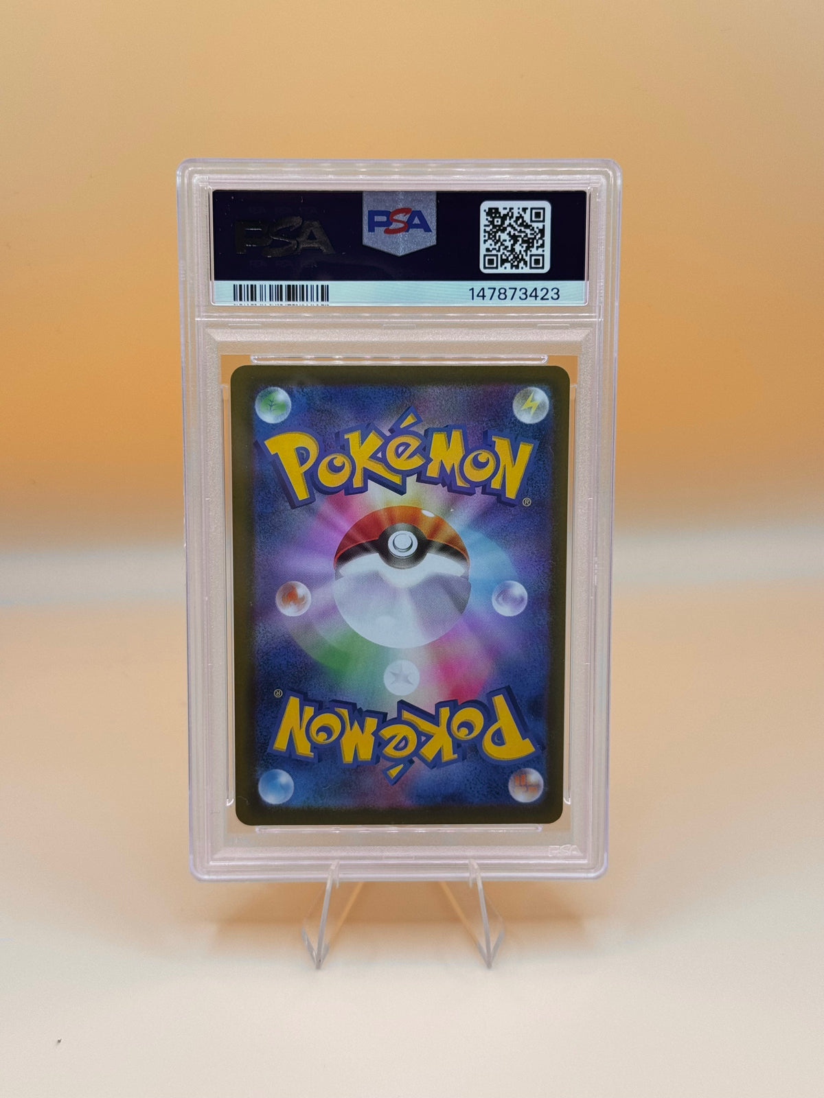 PSA 10 Pokémon-Sammelkarte Heliolisk in transparenter Grading-Hülle, Rückseite
