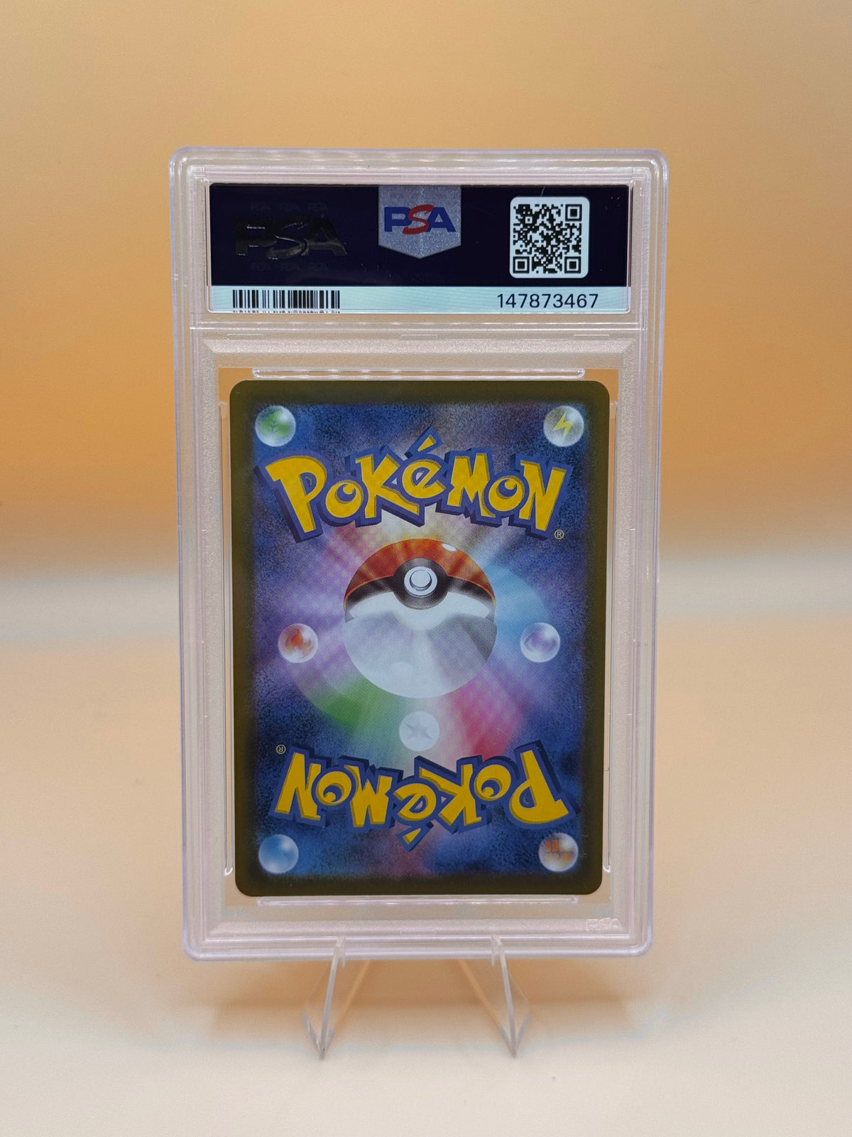 PSA-10 Pokémon-Karte in Kunststoffhülle, Rückseite sichtbar