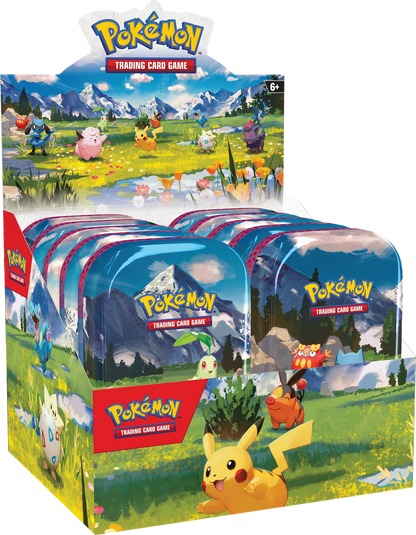Pokémon Mini-Tin Packung mit blauem Landschaftsdesign und Pokémon-Charakteren
